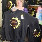 Renee with Solar Eclipse t-shirts and sweatshirts at Happy Thoughts For You