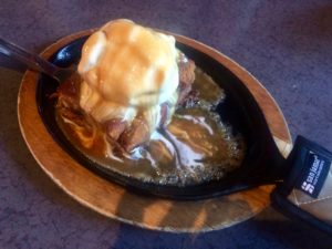 Caramel Almond Bread Pudding with bubbling caramel sauce