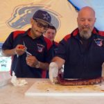 Checking the Ribs for the Spud's competition team at the BBQ Festival