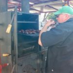 David from Owyhee BBQ tasting chicken