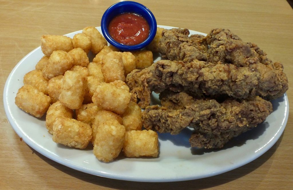 A delicious Idaho specialty, Finger Steaks, Cocktail Sauce and Tater Tots. Photo by Ed Simon for The Boise Beat