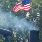 Flag and smoke at the Rock ;n Brews & BBQ Festival in Boise