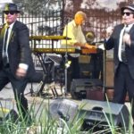 Jake and Elwood singing and dancing at the Idaho Botanical Gardens