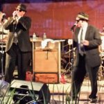 Jake singing with Elwood on Harp