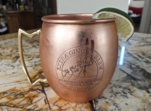 A side view of a Reed's Mug