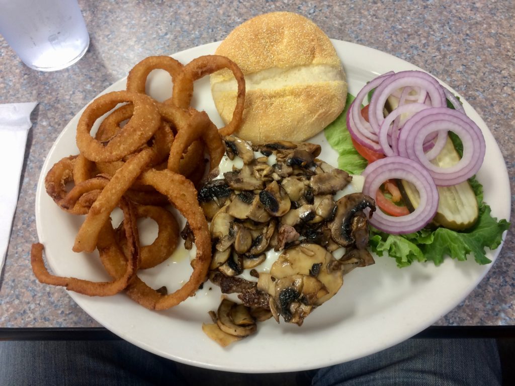 Mushroom Swiss Burger with Onion Rings at the Express Cafe