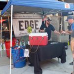 Passing out beer tastes at Edge Brewing