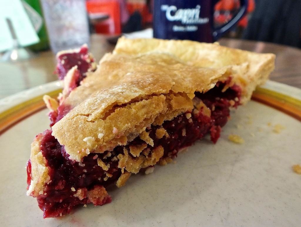 A nice slice of raspberry pie.