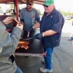 Tasting a pork rib at Owhyhee BBQ