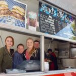 The gang at Spud's BBQ Catering dishing out BBQ