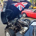 The wind blowing the British flag on car