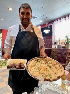 Shams at the Kabob Housewith Tekka Kabob and Garlic Naan