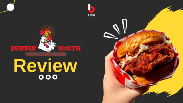 Burnin' Mouth Nashville Hot Chicken review with a hand holding the Coo Coo Sando.