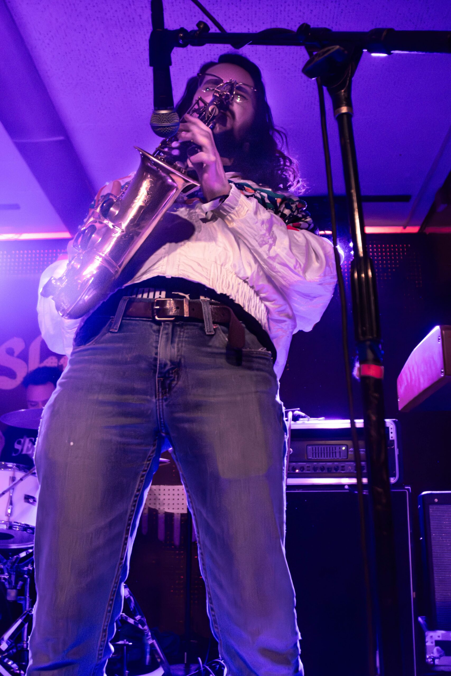 Olivia Vika band member playing saxophone on stage at the 2024 Treefort Music Festival.