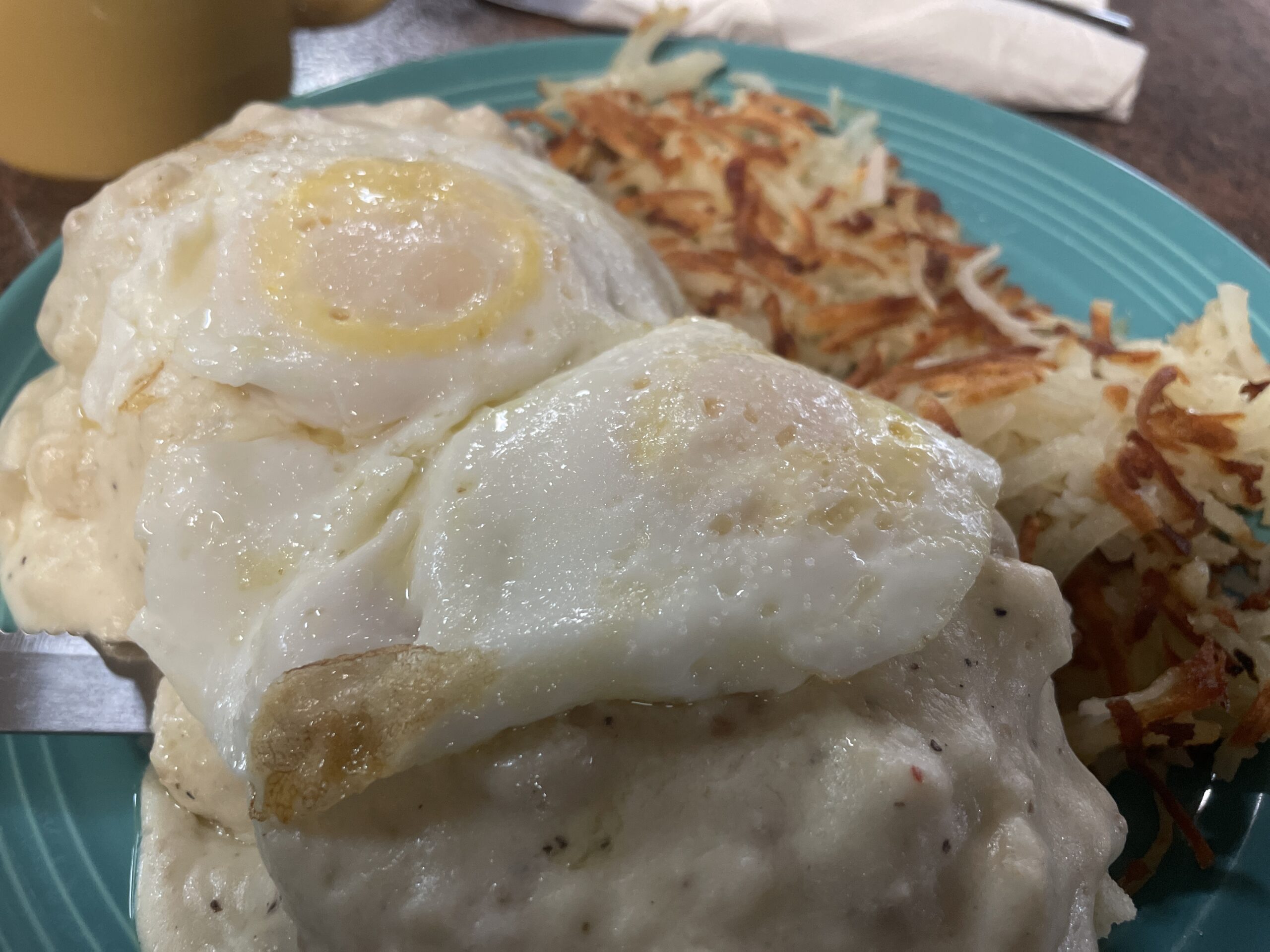 Biscuits and gravy with hash browns and eggs from The Original Sunshine Cafe in Meridian, Idaho.