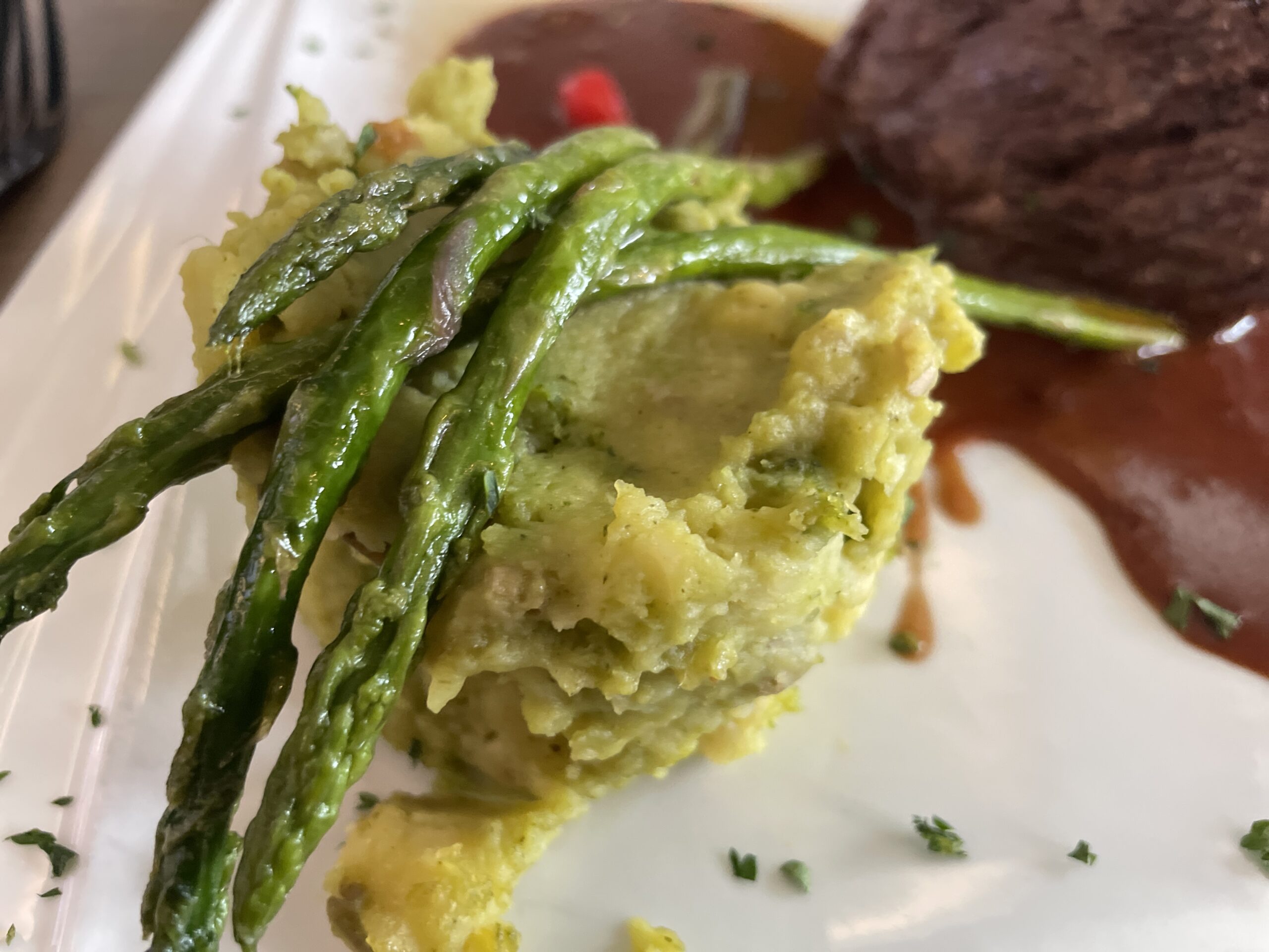 Coa Del Mar Eagle jalapeño, mashed potatoes & a honey-chipotle fig demi-glace and asparagus