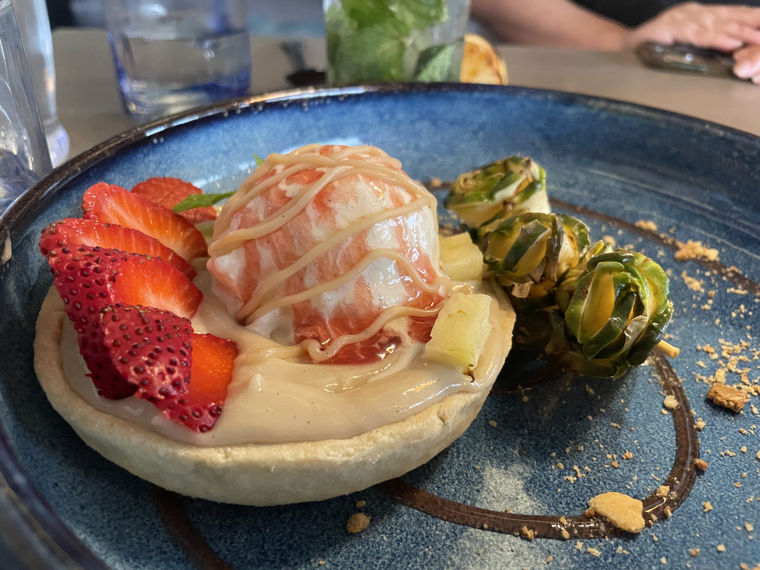 Guava ice cream tart with fresh strawberries and pineapple from Coa Del Mar in Eagle Idaho.