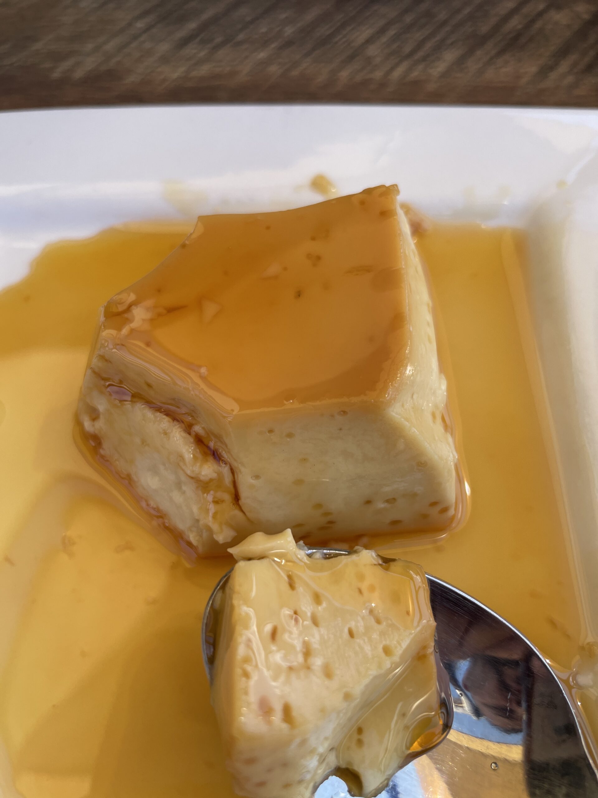 Creamy flan dessert with caramel sauce at Wepa Café.