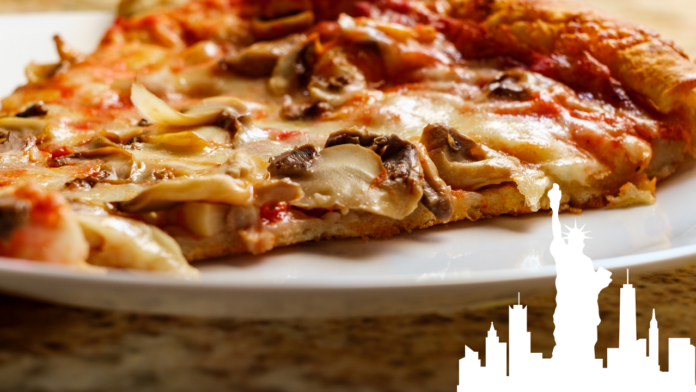 A close-up of a slice of New York-style pizza topped with fresh mushrooms, melted cheese, and tomato sauce, served on a white plate. The image features a stylized silhouette of the Statue of Liberty and New York City skyline in the bottom-right corner.