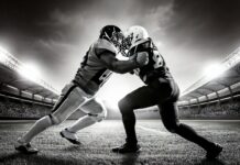 2025 NFL Championship Preview: Breaking Down the Final Showdown Black and white action shot of two professional American football linebackers colliding on the field under stadium lights.