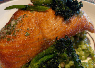Roasted salmon dish with broccolini and fregola pasta at North Italia in The Village at Meridian