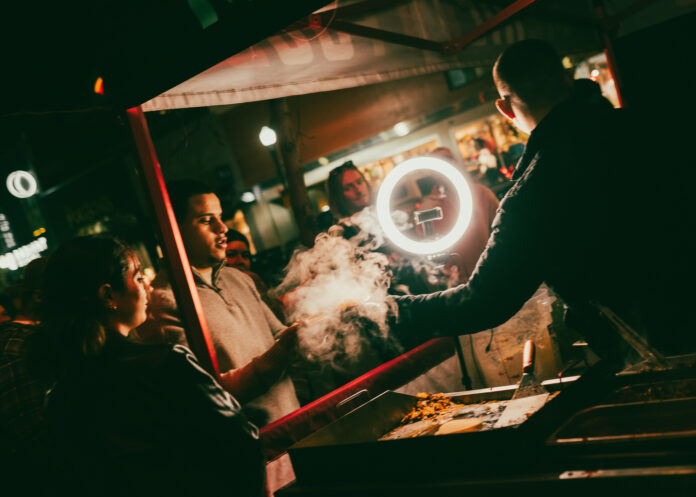 Customers ordering tacos at Gallos Tacos food truck in downtown Boise, Idaho.