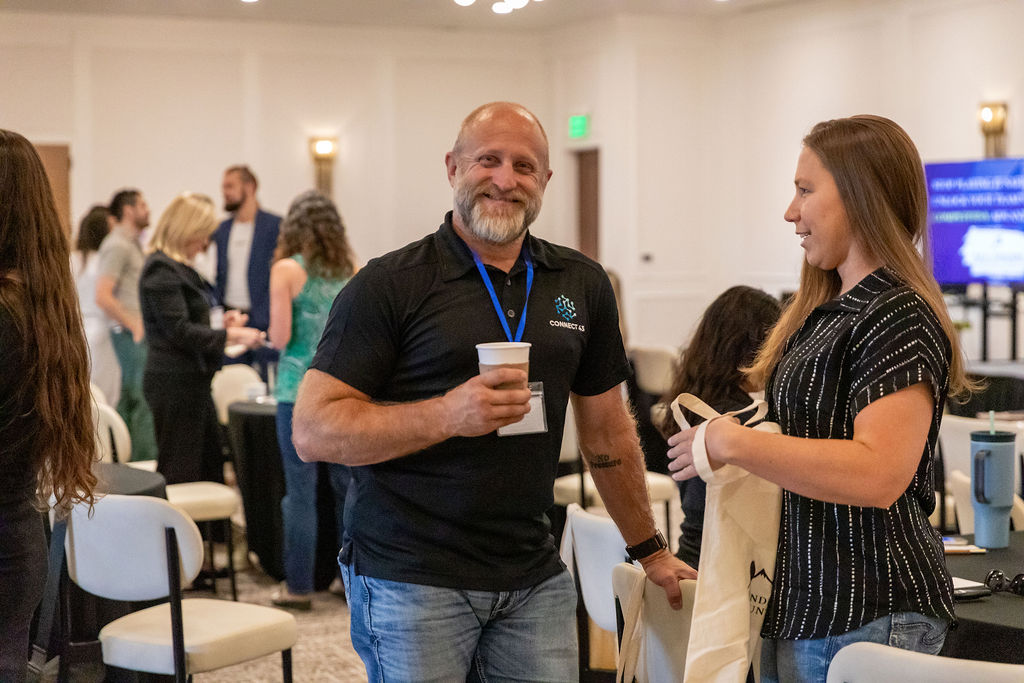 Attendees network and connect over coffee at Innovate Boise’s Founders of the Mountain West 2025 event in Boise, Idaho.