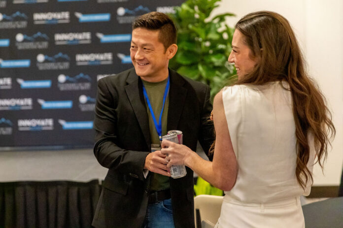 Paul Wilch and Brittany Hansen share a moment of conversation during Innovate Boise’s Founders of the Mountain West 2025 event in Boise, Idaho.