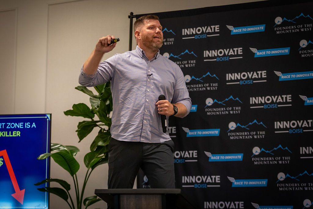 Brandon Johnson of M.E.&I Coaching speaking on leadership and mindset at Innovate Boise’s Founders of the Mountain West 2025 event.