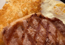 Rare Steakhouse: A Star-Worthy Culinary Gem in the Heart of Idaho Grilled pork chop breakfast with sunny-side egg and crispy hash browns at Rare Steakhouse in Star, Idaho.