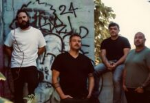 Mylo Bybee Revisions EP Interview: Fatherhood, Alaska & Indie Rock Evolution Mylo Bybee indie rock band members posing against graffiti wall in Boise Idaho promotional photo for Revisions EP