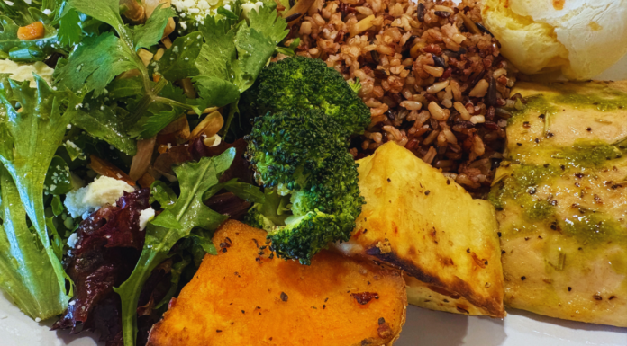 Aubergine Kitchen Meridian Review: Clean Eating That Actually Hits Wild salmon plate from Aubergine Kitchen in Meridian Idaho with herb glaze, roasted vegetables, brown rice, and fresh mixed greens salad